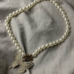 Butterfly pearl necklace